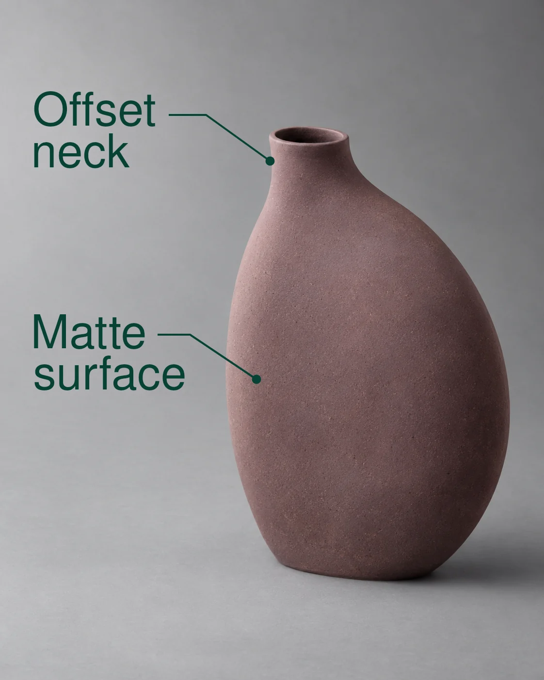 Plum-coloured vase on a grey background, with labels highlighting its offset neck and matte surface.